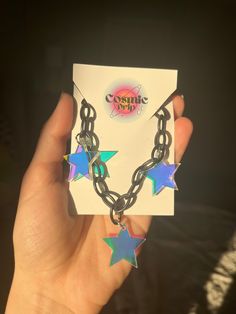 FREE Shipping on orders $35 and up! Star Girl Choker The Star Girl choker is made with high-quality lightweight material, perfect for raves and festivals! The iridescent star charms shine and reflect prisms of light under the sun.  - Charms are made with lightweight iridescent acrylic- color appearance changes depending on lighting - Adjustable from 14 to 16 inches (message me for length customizations up to 20-22inches) Matching earrings here!-  https://www.etsy.com/listing/1380601428/star-irid Rave Multicolor Choker For Festivals, Trendy Rainbow Choker As A Gift, Trendy Rainbow Choker For Gifts, Trendy Rainbow Choker Gift, Trendy Rainbow Choker As Gift, Rave Jewelry, Girls Choker, Iridescent Acrylic, Rave Accessories