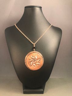 "Two layers of copper were used to create this sunburst. The sun is raised so it has dimension and this  piece was cold connected to a larger base that was hand hammered to create the texture. The pendant is 2\" in diameter and is topped with a black crystal and suspended from a 25\" copper chain with a lobster claw closure. NC1679" Copper Etching, Peacock Jewelry, Blue Peacock, Key To My Heart, Copper Pendant, Lobster Claws, Copper Necklace, Copper Chain, Copper Pendants