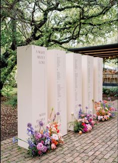 flowers are lined up in front of the memorial