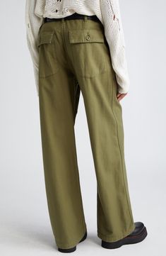 These utility pants are cut in a wide-leg silhouette from Japanese surplus military sateen that's slubbed and treated with an enzyme wash for softness. 32 1/2" inseam; 22" leg opening; 13 1/2" front rise; 17" back rise (size 29) Button fly Front slant pockets; back button-flap patch pockets 100% cotton Machine wash, dry flat Imported SPACE: A shop for emerging and advanced designers Casual Olive Wide Leg Pants With Pockets, Olive Wide Leg Work Pants, Olive Wide Leg Pants For Work, Relaxed Fit Linen Cargo Style Bottoms, Relaxed Fit Wide Leg Pants In Khaki, Olive Utility Bottoms For Fall, Relaxed Fit Linen Cargo Bottoms, Straight Leg Linen Bottoms With Cargo Pockets, Olive Wide Leg Cargo Pants For Work