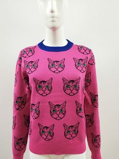 Elevate your cold weather wardrobe with our stylish women's sweater featuring adorable cats and long sleeves. Made with warm and comfortable fabric, this sweater is perfect for any occasion. Stay cozy and on-trend with this fashionable addition to your closet. Pattern Type: Cartoon Clothing Length: Regular Material: Polyester Material: Acrylic Collar: O-Neck Origin: US(Origin) Season: Spring/Autumn Decoration: NONE Sleeve Length(cm): Full Sleeve Style: Regular Thickness: STANDARD Style: Casual P Fall Crew Neck Sweater With Cat Design, Crew Neck Sweater With Cat Design For Fall, Trendy Knit Sweatshirt, Trendy Long Sleeve Sweater With Ribbed Cuffs, Winter Cat Print Crew Neck Sweater, Cozy Fit Winter Sweater For Loungewear, Cotton Knitted Long Sleeve Sweatshirt, Winter Pink Cotton Sweater, Knitted Cotton Sweatshirt