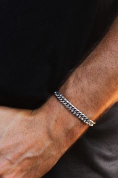 This elegant bracelet made of high-quality stainless steel impresses with its simple but striking design. The dense, interlocking links give the bracelet a robust yet elegant look that goes well with both casual and formal outfits. Perfect for men who are looking for understated and long-lasting jewelry. Details: Material: High-quality stainless steel, rust-proof and durable Surface: Shiny, polished look Length: 19 cm + 5 cm extension Bracelet width: 7 mm Closure: Secure snap fastener for easy handling with extension part Care: Easy to care for - simply clean with a soft cloth to maintain the shine This bracelet is the ideal everyday accessory and makes a great gift for someone special or to add to your own jewelry collection. Why stainless steel? Not only does stainless steel offer excell S Bracelet, Jewelry Details, Formal Outfits, Men's Bracelet, Elegant Bracelet, Snap Fasteners, Bracelet For Men, Everyday Accessories, Formal Outfit