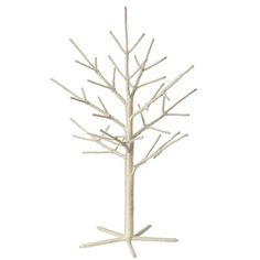 a white tree with no leaves is shown on a white background, it looks like an artificial