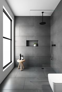 a white bath tub sitting next to a window