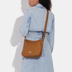 Refined pebble leather Inside multifunction pocket Zip-top closure fabric lining Outside zip pocket Adjustable strap with 21 drop for shoulder or crossbody wear 10 1/4 (L) x 9 1/2 (H) x 2 3/4 (W) Style No. CU960 Classic Crossbody Hobo Bag For Fall, Classic Fall Crossbody Hobo Bag, Classic Fall Hobo Bag Crossbody, Crossbody Bag For Work And Fall Season, Fall Shoulder Bag With Gold-tone Hardware, Crossbody, Fall Crossbody Shoulder Bag With Gold-tone Hardware, Fall Saddle Bag For Everyday Use, Versatile Bags With Gold-tone Hardware For Fall, Fall Satchel Saddle Bag