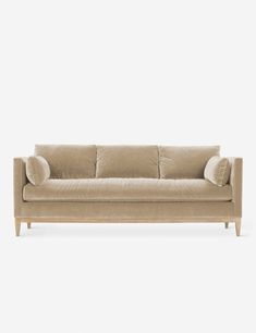 Modern Parisian Sofa, Timeless Couches Sofas, Airy Modern Living Room, Modern Velvet Couch, Tan Velvet Couch, Beige Velvet Couch, Simple Couches Living Room, Dark Brown Velvet Sofa, Sand Colored Couch