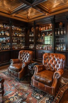 two brown leather chairs sitting in front of a bar