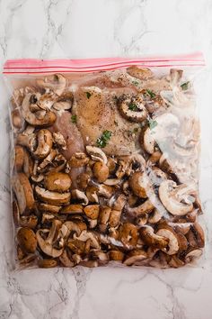 a bag filled with mushrooms sitting on top of a counter