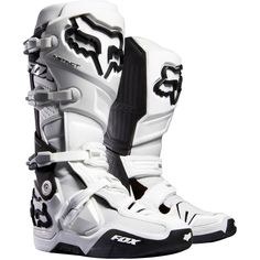 a pair of white and black motorcycle boots with the words missionmxx on it