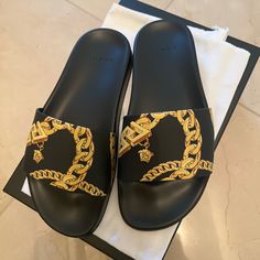 Versace Pool Slide Sandals Black And Gold Size 7 Luxury Black Slides For The Beach, Luxury Black Slides For Beach, Luxury Slides For Summer Party, Elegant Black Slides For Beach, Luxury Black Beach Slides, Elegant Black Beach Slides, Luxury Summer Party Slides, Designer Black Slides For Beach, Black Slides For Summer Evenings