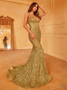 Product Code: LAWD8017 Embellishment: Sequin Fabric: 100% Polyester Back Style: Zipper Up Fully Lined: Yes Built-in Bra: Yes Available Color: Gold Stretch: Moderate Fits true to size Imported Model Information: Height: 5' 2" Bust: 34'' Waist: 25“ Hips: 35” wearing US size Small Gold Mermaid Dress For Prom, Gold Glamorous Mermaid Dress For Banquet, Glamorous Gold Mermaid Dress For Banquet, Gold Mermaid Hem Dress For Prom Season, Glamorous Gold Mermaid Hem Dress, Fitted Gold Mermaid Dress With Sweep Train, Gold Fitted Mermaid Hem Evening Dress, Gold Fitted Evening Dress With Mermaid Hem, Glamorous Gold Mermaid Dress For Prom Season