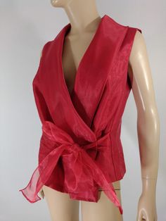 "Womens Red Disco Shimmery Sleeveless Blouse Excellent Condition Vintage by ONYX NITE Size XL 80's 90's Lux GORGEOUS red sleeveless blouse. Shimmery shiny lux fabric in red semi sheer over solid red satiny fabric...huge drama collar and crossover front with large tie, deep V neckline. Super high quality. Really nice piece. Excellent condition. Made in USA vintage. Easy to wear casual chic vintage for the disco sporting life. MEASUREMENTS: Length- 23\" Bust (underarms to underarms)  21\"x 2  Slee Formal Sleeveless Vest For Spring, Elegant Fitted Red Vest, Formal Vest For Spring, Red Fitted Party Vest, Red Fitted Vest For Party, Red Fitted Vest For Spring, Fitted Red Vest For Spring, Red Sleeveless Formal Tops, Red V-neck Vest For Spring