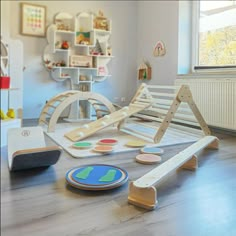 a child's play room with toys on the floor