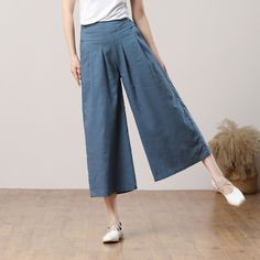 "Cool and comfortable for hot summer days, this blue wide leg pants is elegant and stylish.    It is a wonderful wardrobe staple that's a timeless classic you'll wear again and again.  All our items are Tailored and Handmade and Made to Order ,I can make Any Size . I design new styles every week, please collect my store. I believe that you will meet your favorite styles. ★★FEATURES 100% cotton Two side pockets Back elastic waist Wide leg pants Blue pants Casual pants Long pants Loose pants Plus Versatile Blue Wide Leg Pants With Pockets, Summer Straight Pants In Solid Color, Wide Leg Cotton Capris, Summer High-waisted Wide Leg Pants In Solid Color, Summer High-waisted Wide Leg Pants Solid Color, Summer Wide Leg Relaxed Fit Capris, Wide Leg Relaxed Fit Summer Capris, Wide Leg Relaxed Fit Capris For Summer, Summer Wide Leg Culottes