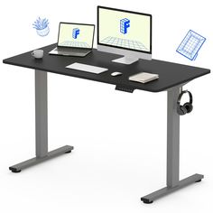 a computer desk with two laptops and headphones sitting on it's legs