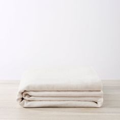 the linen is folded on top of each other