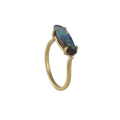 This gorgeous ring showcases the iridescent qualities of natural opal set on a delicate 18k yellow gold band. Handmade in Japan. Natural opal 18k yellow gold Size 7.25, can be sized within a range.