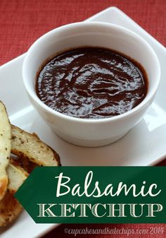 balsamic ketchup in a white bowl next to bread on a plate