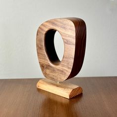 a wooden object sitting on top of a table