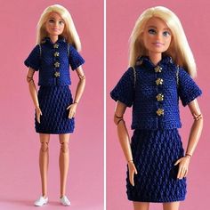 the doll is wearing a blue dress with gold buttons on it and has her hands in her pockets