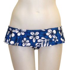 Ruffled skirted covered bottom. Printed Blue Swimwear For Vacation, Blue Printed Swimwear For Vacation, Beachy Blue Printed Swimwear, Fitted Hawaiian Style Bottoms For Poolside, Blue Tropical Printed Swimwear, Blue Printed Tropical Swimwear, Blue Floral Print Swimwear, Blue Tropical Print Bottoms For Poolside, Blue Hawaiian Bottoms For Beach Party