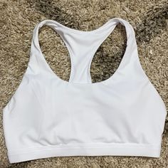 White Sports Bra With Cute Color Pops On The Back! Never Worn But Tag Has Been Removed. Has Removable Padding. White Yoga Sports Bra With Built-in Padding, White Sports Bra With Built-in Padding For Workout, White Activewear With Built-in Padding For Gym, White Activewear With Built-in Bra For Training, White Activewear With Built-in Padding For Yoga, White Sporty Activewear With Built-in Bra, White Racerback Activewear With Built-in Padding, White Sports Bra With Built-in Padding For Yoga, White Sports Bra With Built-in Bra For Gym