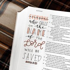 an open bible with the words everyone who calls on the name of the lord will be saved