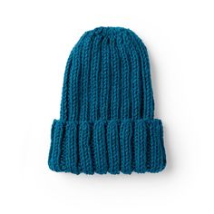 a blue knitted hat on a white background