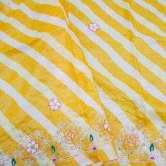 Category: Leheriya Tussar Dupatta Check out this latest collection of Tussar dupattas from Khinkhwab, the online shop bringing the essence of Handloom Banarasi silk. Fabric - Pure Tussar Silk Color - Yellow Craftsmanship: Pearl & Zardozi Embroidery Note- There may be slight color variations due to photographic reasons. This is a hand-woven product. Any irregular weaving or pattern should not be considered a defect. These irregularities make every handloom piece unique. Yellow Embroidered Unstitched Slub Silk Suit, Yellow Embroidered Slub Silk Unstitched Suit, Yellow Slub Silk Salwar Kameez With Dori Work, Yellow Slub Silk Anarkali Set With Dupatta, Yellow Slub Silk Dupatta With Gota Work, Slub Silk Dupatta With Dori Work In Traditional Drape, Yellow Slub Silk Salwar Kameez With Dupatta, Bollywood Style Slub Silk Dupatta With Dori Work, Yellow Anarkali Unstitched Suit In Slub Silk