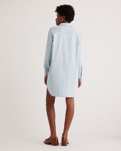 It's the versatility and comfiness of your favorite broken-in jeans, but in our Distressed Denim Shirt Dress. Style it sporty with sneakers and a baseball cap or dress it up with shimmery extras from head to toe—either way, you'll wear this one way more often than you think.  | Quince | Women's Distressed Denim Shirt Dress in Light Chambray, Size XS, Cotton Denim Shirt Dress, Shirt Dress Style, Mink Pink, Black Charcoal, Quince, Denim Shirt, Distressed Denim, Chambray, Blue Stripes