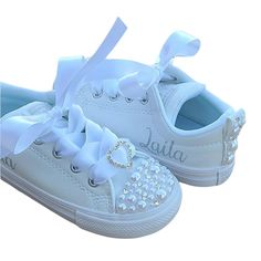 Perfect for a flower girl or other important event. Different sizes of pearls are used and silver/clear crystals are added as well. So much sparkle! The backs are done as well with crystals and pearls and a silver rhinestone heart is added to the white ribbon ties. These leather shoes run big so you most likely will need to size down. Cute White Canvas Shoes, White Closed Toe Canvas Shoes, White Canvas Closed-toe Shoes, All White Converse, Converse Baby, Converse Girls, White Slip On Sneakers, Toddler Converse, Flower Girl Shoes