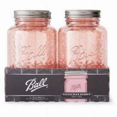 two pink ball mason jars with lids