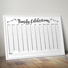 a family celebration calendar is displayed on a table