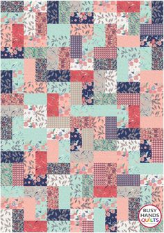 an image of a patchwork quilt pattern with flowers and leaves on the front, in blue