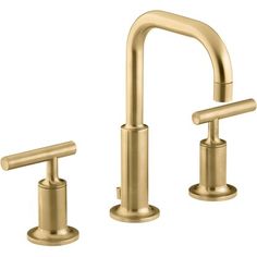 two faucets with handles in gold