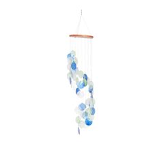 a wind chime with blue and white circles hanging from it