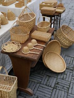 wicker baskets are lined up on a table