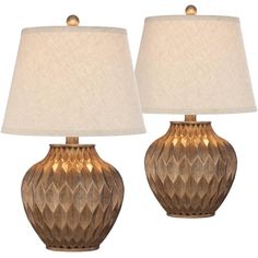 two lamps are sitting next to each other