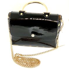 Vegannwtblack Faux Patten Leather Bag Brand New With Tag! Approximate Measurements: 7.25”L X 2.75”W X 5.50”H Materials: Faux Leather Colors: Black Gold Tone Hardware Gold Tone Studs Trim Gold Tone Chain Crossbody Strap Gold Tone Hardware Round Shape Handle Fold Over Magnetic Snap Closure No Pockets One Open Spacious Compartment Questions Are Welcomed. Thank You For Stopping By Again. Leather Colors, Black Leather Satchel, Leather Laptop Bag, Black Espadrilles, Leather Laptop, Leather Hobo Bag, Bag Brand, Leather Hobo, Fold Over