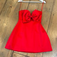 Amazing Fit With How Detail Elegant Fitted Dresses With Red Bow, Red Evening Dress With Bow, Red Evening Dress With Red Bow, Red Dress With Red Bow For Evening, Red Sleeveless Mini Dress For Gala, Chic Red Midi Dress With Sweetheart Neckline, Chic Red A-line Mini Dress, Elegant Evening Dress With Red Bow, Red Holiday Dress With Bow