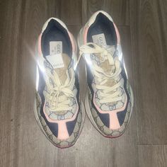 Like Only Wore A Couple Of Authentic Gucci Women’s Rhyton Gg Supreme Logo Sneakers - Size 8.5 Description: Step Up Your Sneaker Game With These Authentic Gucci Rhyton Gg Supreme Logo Sneakers, Size 8.5. These Luxurious Sneakers Feature A Blend Of The Iconic Gg Monogram Print And Contrasting Leather Panels In Neutral And Pastel Shades. The Chunky Sole Provides Comfort And An On-Trend Look, While The Lace-Up Closure Ensures A Secure Fit. Perfect For Casual Streetwear Or Elevating Your Everyday Out Gucci Low-top Cream Sneakers, Gucci Beige Low-top Sneakers, Gucci Cream Low-top Sneakers, Gucci Casual Cream Sneakers, Casual Gucci Cream Sneakers, Casual Cream Gucci Sneakers, Gucci Pink Sneakers With Rubber Sole, Pink Gucci Sneakers With Rubber Sole, Gucci Casual Pink Sneakers