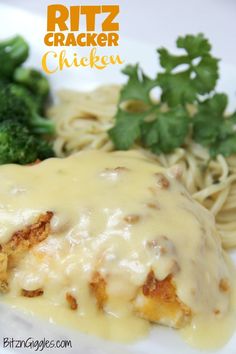 chicken parmesan with gravy and broccoli on a white plate