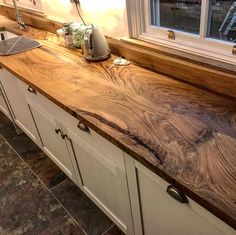 a kitchen counter top made out of wood