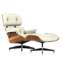 an eames lounge chair and ottoman in white leather with wood grained finish, viewed from the front