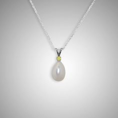 When it comes to beauty this pearl pendant speaks for itself, and the color yellow is reminiscent of sunshine to warm your heart throughout the day. The pearl in this piece is 8 mm x 9 mm, and it has a wonderful color. The simple setting allows the pearl to be the main focus of attention. This pendant works with one of your elegant outfits as well as your jeans and t-shirt. Linda Allard holds a graduate pearl certification from Gemological Institute of America (GIA) and carefully inspects each p Gift Yellow Pearl Drop Jewelry, Yellow Pearl Drop Jewelry Gift, Yellow Pearl Jewelry Gift, Yellow Jewelry With Pearl Charm As Gift, Yellow Pearl Necklace As Gift, Yellow Round Pearl Necklace As A Gift, Yellow Pearl Necklace As A Gift, White Teardrop Pearl Necklace With Gemstone, Yellow Pearl Necklace For Gift