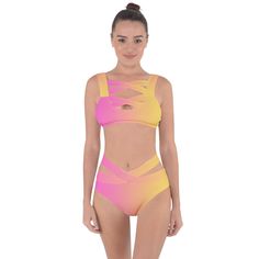 Unleash your beachside glow with the Sunkissed Sorbet Bandaged Up Bikini Set by Mila Beachwear. This stunning set features a vibrant sorbet-inspired print and a bold bandage-style design, ensuring you make a statement at any beach or poolside gathering. Crafted from high-quality, quick-drying fabric, this bikini set offers exceptional comfort, flexibility, and durability. The intricate bandage straps on the top and matching bottoms create a chic, flattering silhouette that blends boldness with style. Elevate your swimwear collection with the Sunkissed Sorbet Bandaged Up Bikini Set by Mila Beachwear. Its eye-catching design and meticulous details make it perfect for the confident beachgoer who loves to stand out with elegance and flair. Strappy Multicolor Swimwear For Beach Party, Multicolor Strappy Beachwear Swimwear, Rave Swimwear For Beach Season And Pool, Rave Swimwear For Summer, Rave Swimwear For Summer Vacation, Rave Multicolor Swimwear For Swimming, Rave Multicolor Swimwear For Vacation, Multicolor Rave Swimwear For Swimming, Rave Style Multicolor Swimwear For Swimming