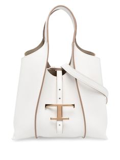 Timeless logo charm tote bag from TOD'S featuring calf leather, logo charm, press-stud fastening, two long top handles, main compartment and white. | Tod's Timeless logo charm tote bag Timeless Logo, Tods Bag, Heeled Rain Boots, Mini Tote Bag, Backpack Tote Bag, Leather Shops, Mini Tote, Leather Logo, Tote Backpack