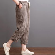 2016 Khaki striped linen pants summer crop pantsThis dress is made of cotton linen fabric, soft and breathy, suitable for summer, so loose dresses to make you comfortable all the time.Measurement: Size M length 77cm / 30.03"Hip104cm / 40.56" Waist 64cm / 24.96" Leg Cir 36cm / 14.04" Size L length 78cm / 30.42"Hip108cm / 42.12" Waist 66cm / 25.74" Leg Cir 38cm / 14.82"Materials used:linenPayment: We accept payment by paypal and credit card. if you would like to pay by credit card, please choose p Striped Linen Beach Pants, Striped Linen Bottoms For Spring, Striped Linen Pants For Spring, Striped Linen Pants With Elastic Waistband, Summer Linen Striped Bottoms, Beige Cotton Harem Pants For Summer, Spring Striped Linen Pants, Relaxed Spring Harem Pants, Ankle-length, Relaxed Ankle-length Harem Pants For Spring