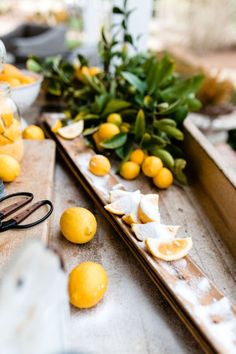 some lemons and other fruit on a table