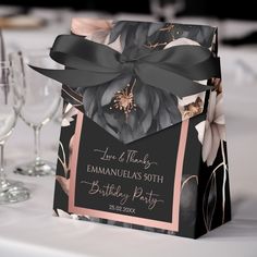 an elegant black and pink birthday party with wine glasses